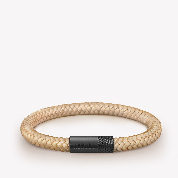 Beige dunne armband met zwarte stalen sluiting