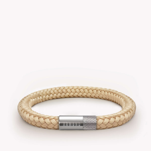 Beige dunne armband met zilveren stalen sluiting