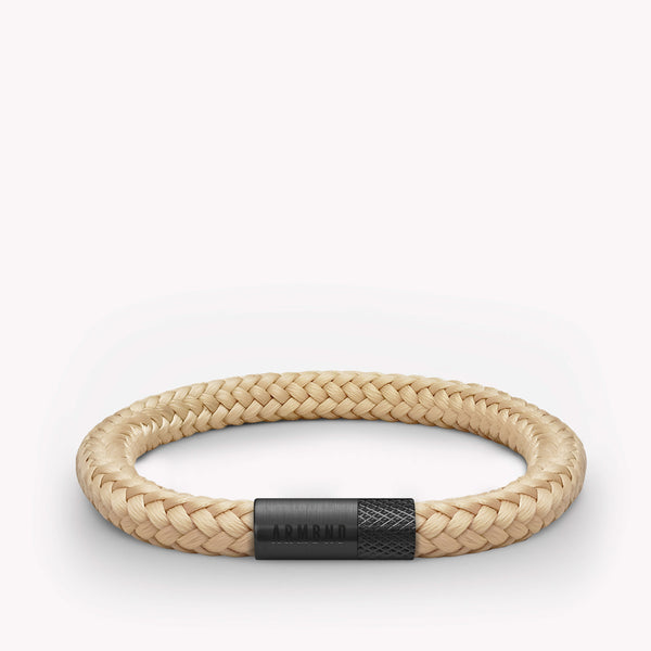 Beige dunne armband met zwarte stalen sluiting
