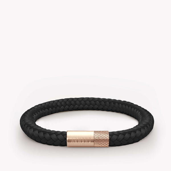 Schwarzes dünnes Armband mit roségoldenem Stahlverschluss