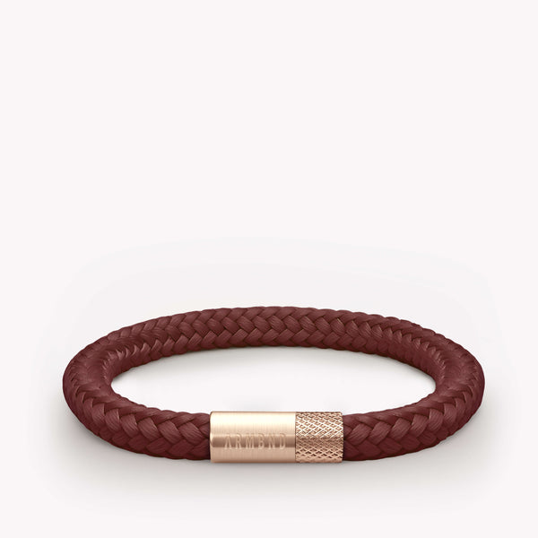 Donkerrode dunne armband met rosé gouden stalen sluiting