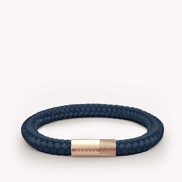 Donkerblauwe dunne armband met rosé gouden stalen sluiting