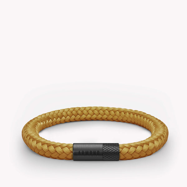 Gelbes dünnes Armband mit schwarzem Stahlverschluss