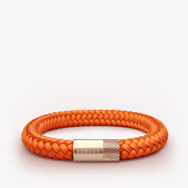 Oranje armband met rosé gouden stalen sluiting